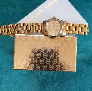Michael kors women goldtone watch
